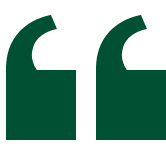 Green quotation marks on a black background.